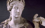 Colossal statue of seated figure of Apollo in porphyry, (Roma Triumphans) Naples, Museo Archeologico Nazionale | Archivio dell'Arte - © photo by Luciano Pedicini